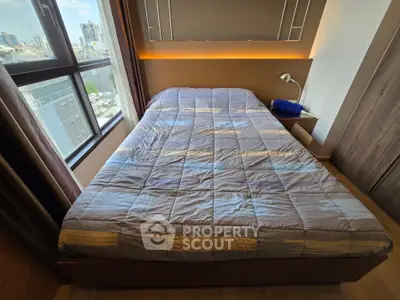 Cozy bedroom with city view and modern decor