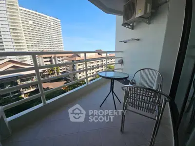 Charming balcony with city view, perfect for relaxation and enjoying the skyline.