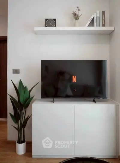 Modern living room with sleek TV stand and minimalist decor