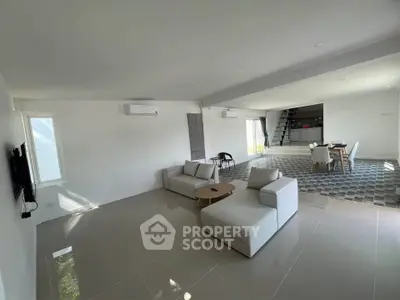 Spacious modern living room with open layout and stylish furniture