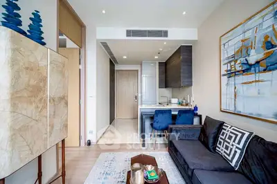 Modern living room with stylish decor and open kitchen layout