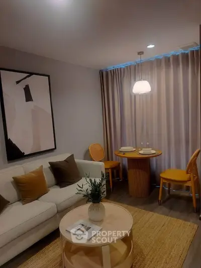 Chic modern living room with cozy dining area and stylish decor