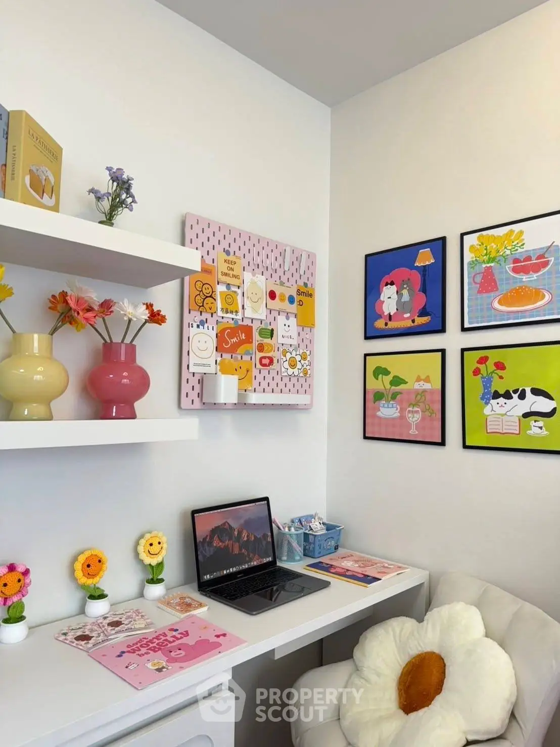 Charming study nook with vibrant decor and cozy seating, perfect for productivity and relaxation.