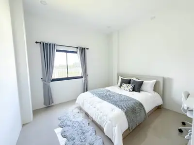 Bright and modern bedroom with cozy decor and natural light