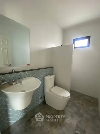 Modern bathroom with sleek fixtures and stylish tile design