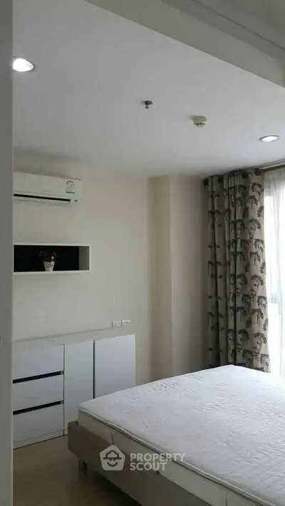 Modern bedroom with minimalist design and natural light