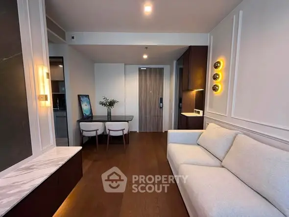 Modern living room with elegant decor and cozy seating area