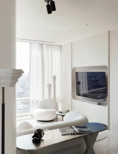 Modern living room with sleek furniture and large window offering city view.