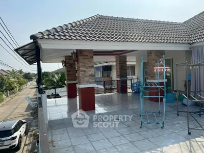 Spacious rooftop terrace with tiled flooring and scenic neighborhood view