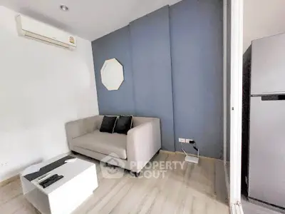 Modern living room with sleek sofa and minimalist decor in stylish apartment