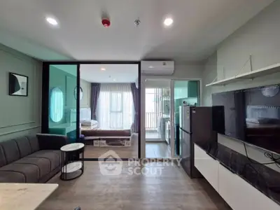 Modern open-plan living room with stylish decor and balcony view
