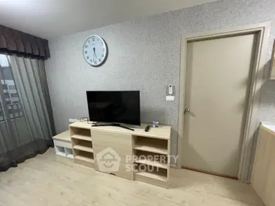 Modern living room with TV and stylish wooden furniture