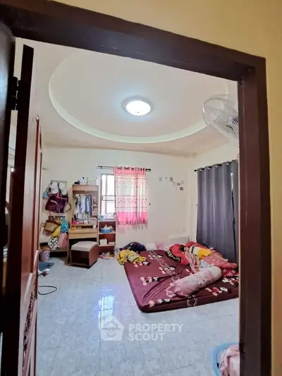 Cozy bedroom with minimalist decor and natural light