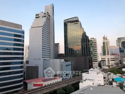 Stunning cityscape view showcasing modern high-rise buildings in a bustling urban environment.