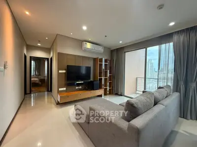 Spacious modern living room with city view and stylish furniture