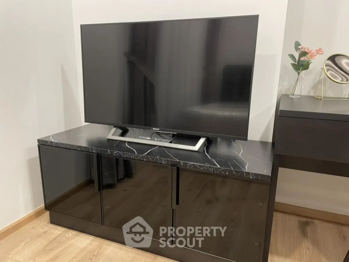 Modern living room with sleek TV stand and stylish decor