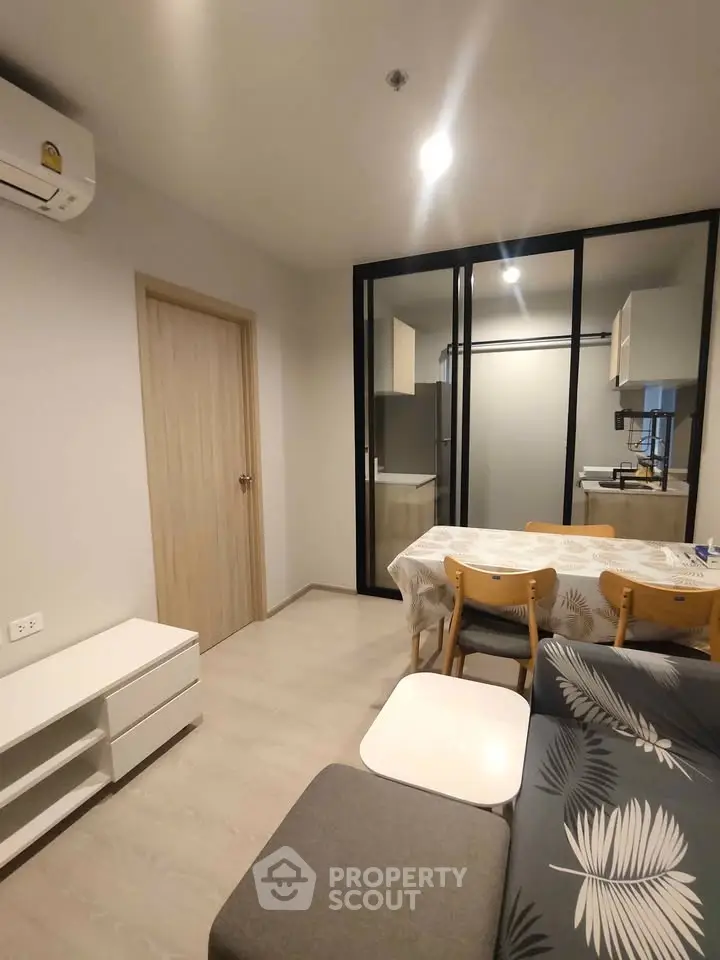 Modern living room with dining area and open kitchen layout