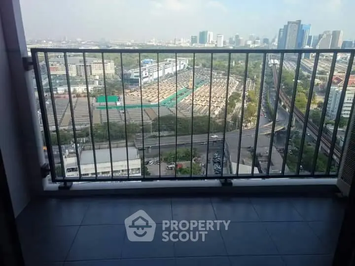 Stunning cityscape view from a high-rise balcony, perfect for urban living enthusiasts.