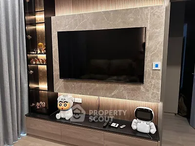 Modern living room with sleek TV setup and stylish decor