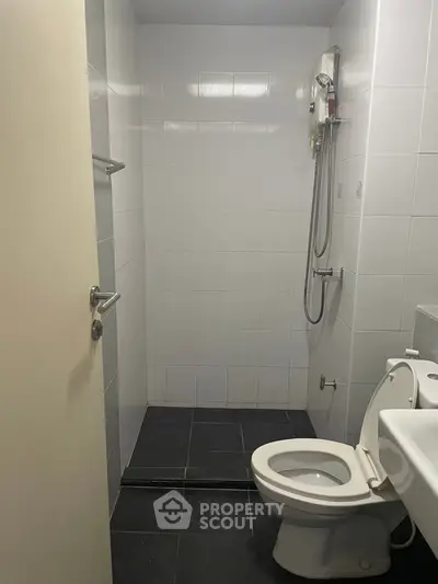 Modern bathroom with shower and toilet in minimalist design