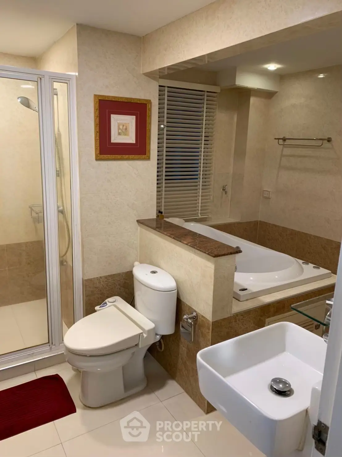 Luxurious bathroom with bathtub and modern fixtures in elegant real estate property.