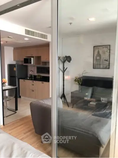 Modern living room with stylish decor and open kitchen layout