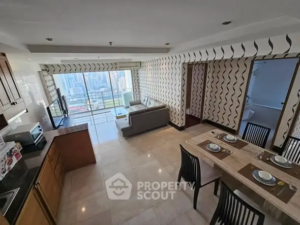 Spacious open-layout living room with city view and modern kitchen