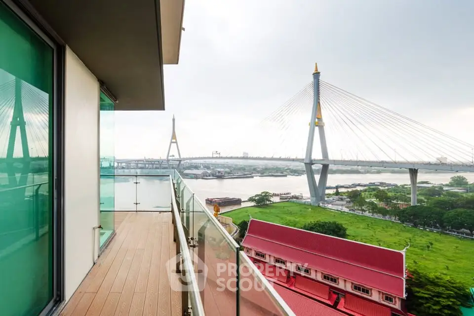 Stunning balcony view of iconic bridge and river, perfect for serene living.