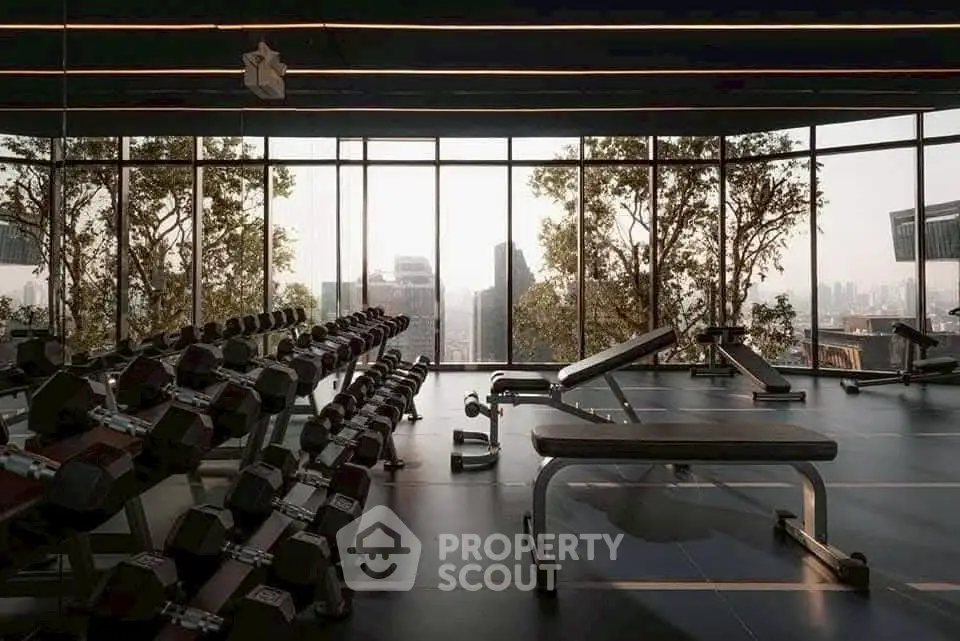 Luxury gym with city skyline view and modern equipment