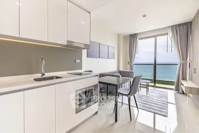 Modern beachfront apartment with open kitchen and stunning ocean view