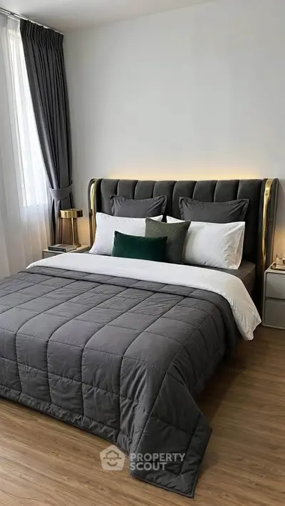 Luxurious bedroom with elegant decor and plush bedding in modern apartment.
