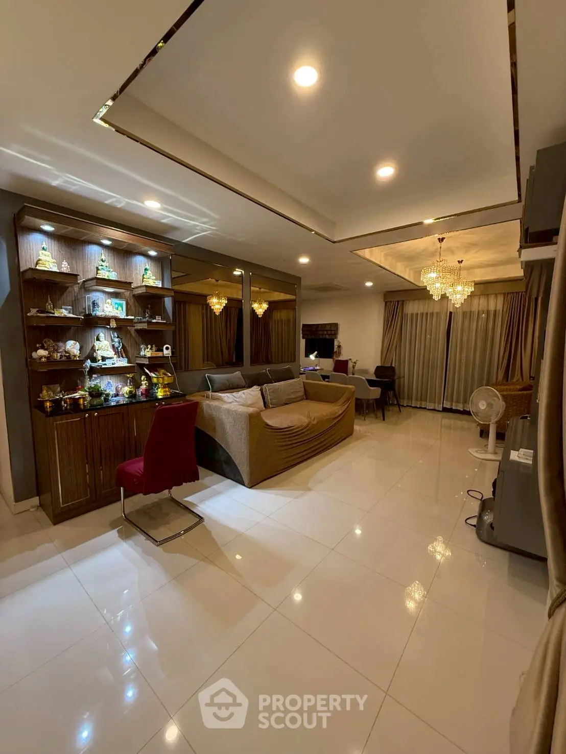 Spacious living room with elegant lighting and modern decor