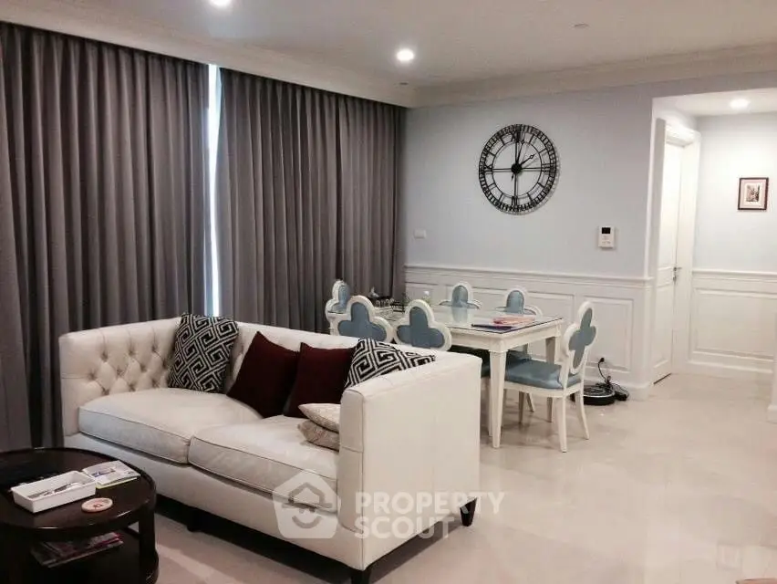 Elegant living room with stylish decor and cozy seating area, perfect for relaxation and entertaining.