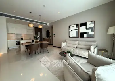 Luxurious open-plan living room with modern kitchen and elegant decor