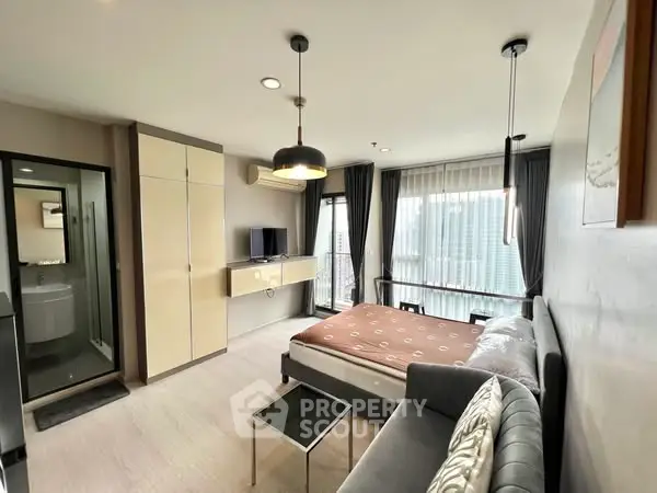 Modern studio apartment with stylish decor and natural light