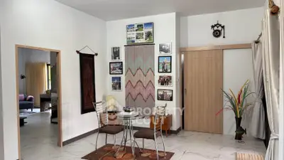 Charming living room with modern decor and stylish furniture in a cozy home setting.