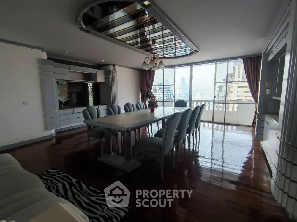 Spacious dining room with elegant table and city view