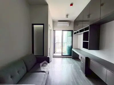 Modern living room with sleek furniture and city view balcony in urban apartment