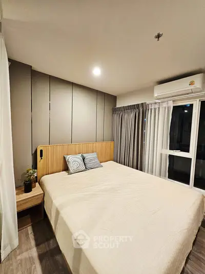 Modern bedroom with cozy decor and natural light