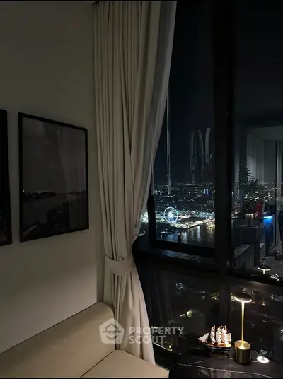 Luxurious living room with stunning night city view and elegant decor