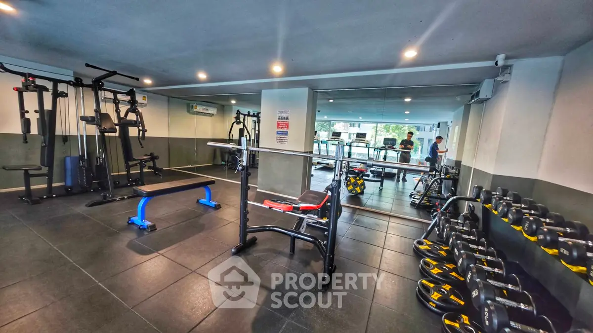 Modern gym with state-of-the-art equipment in a residential building