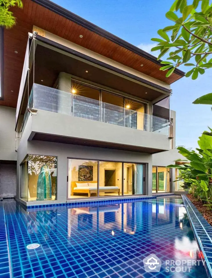 Luxurious modern villa with private pool and spacious balcony, perfect for serene living.