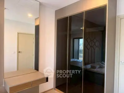 Modern bedroom with sleek wardrobe and stylish decor