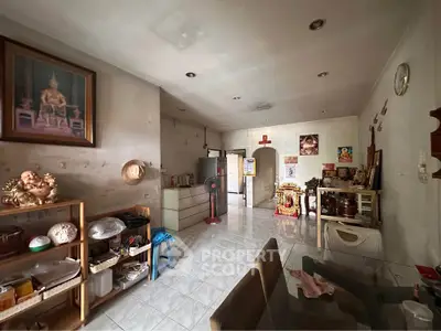Spacious living room with traditional decor and ample storage space, perfect for family gatherings.
