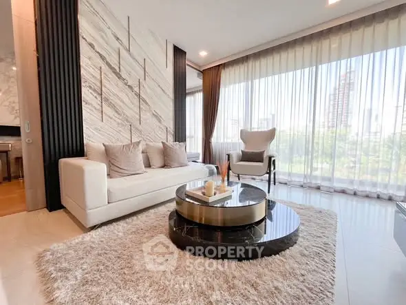 Luxurious modern living room with elegant decor and floor-to-ceiling windows offering city views.
