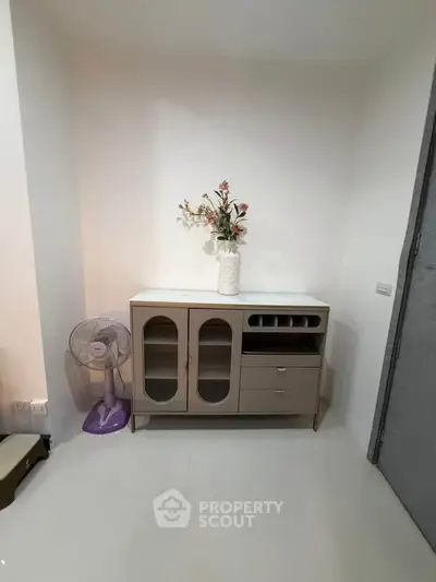Modern interior with stylish cabinet and decorative vase in a cozy corner