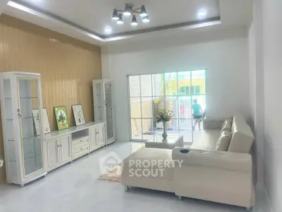 Spacious modern living room with elegant decor and natural light