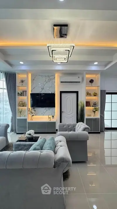 Luxurious modern living room with elegant decor and ambient lighting