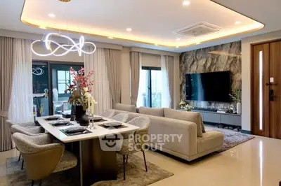 Luxurious modern living room with elegant dining area and stylish lighting