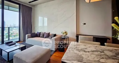 Luxurious modern living room with city view, elegant marble accents, and stylish furniture.